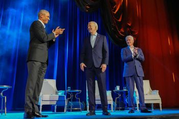 President Joe Biden, center, and former presidents Barack Obama, left, and Bill Clinton, right, participate in a fundraising event at Radio City Music Hall, March 28, 2024, in New York.