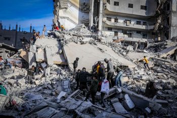 Palestinians inspect the damage from an Israeli air strike in Rafah, in the southern Gaza Strip, on March 9, 2024.