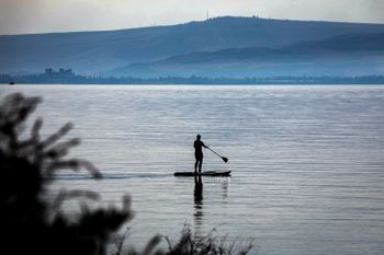 Israelis enjoy in lake Kinneret, Northern Israel on October 21, 2021.
