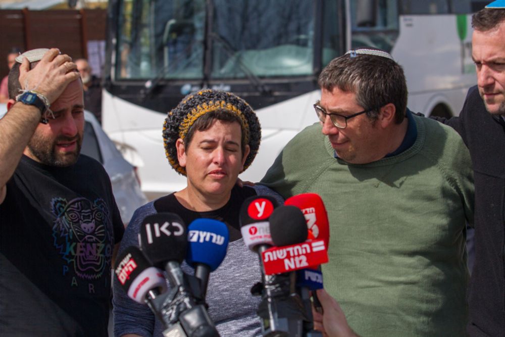 Family of brothers Hallel, 21, and Yagel Yaniv, 19, who were murdered in a terror attack in the West Bank city of Huwara, speak to the press in Har Bracha.