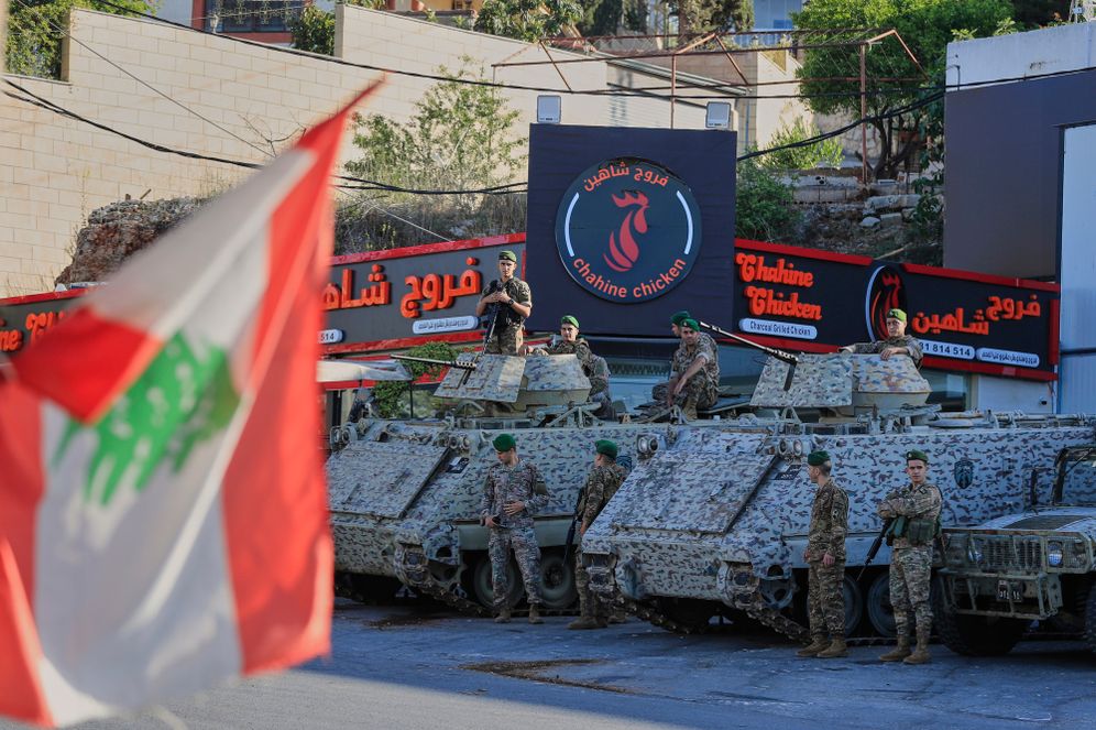 AP Photo/Mohammed Zaatari Lebanese army soldiers sit on their armored vehicles near a polling station during municipal elections in the town of Nabatieh, south Lebanon