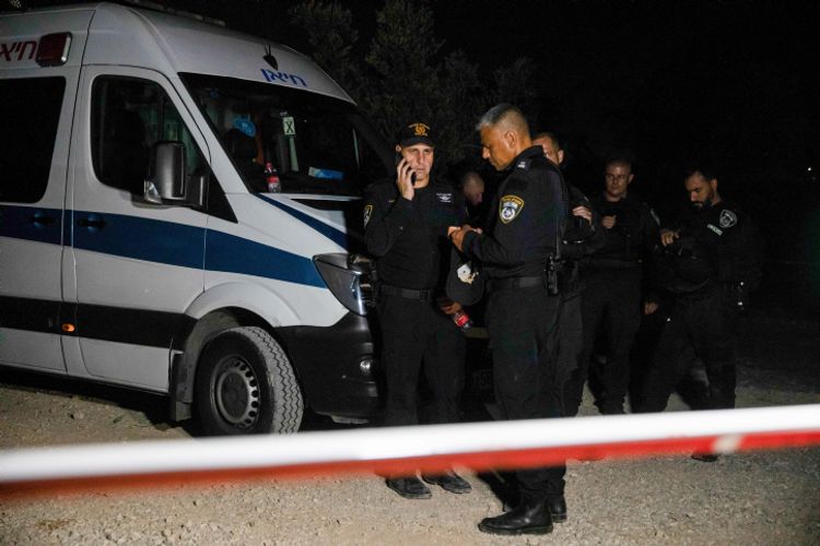 Police at the scene where four men were shot dead in the Arab Town of Abu Snan, northern Israel.