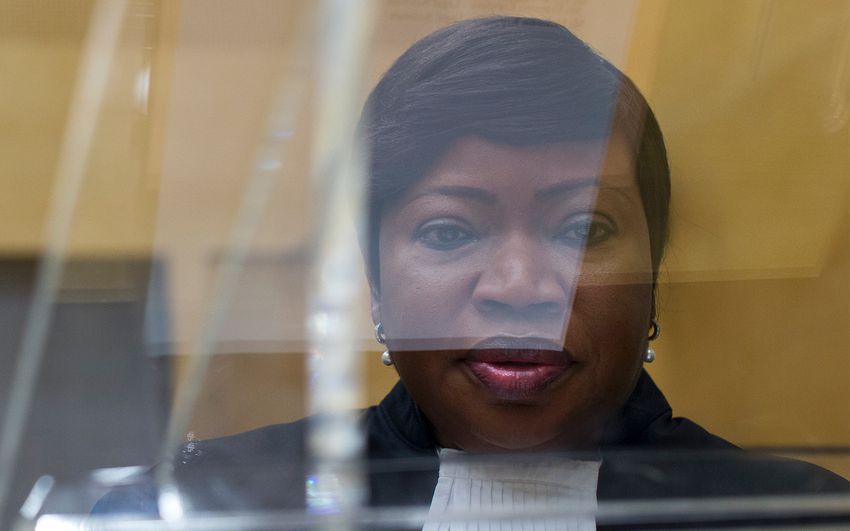 ICC prosecutor Fatou Bensouda is seen through a plexiglass lectern in the court room of the International Criminal Court, in The Hague, Netherlands, September 29, 2015
