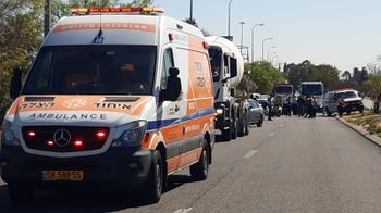 Emergency services respond to a terrorist attack near the central Israeli city of Be'er Ya'akov.