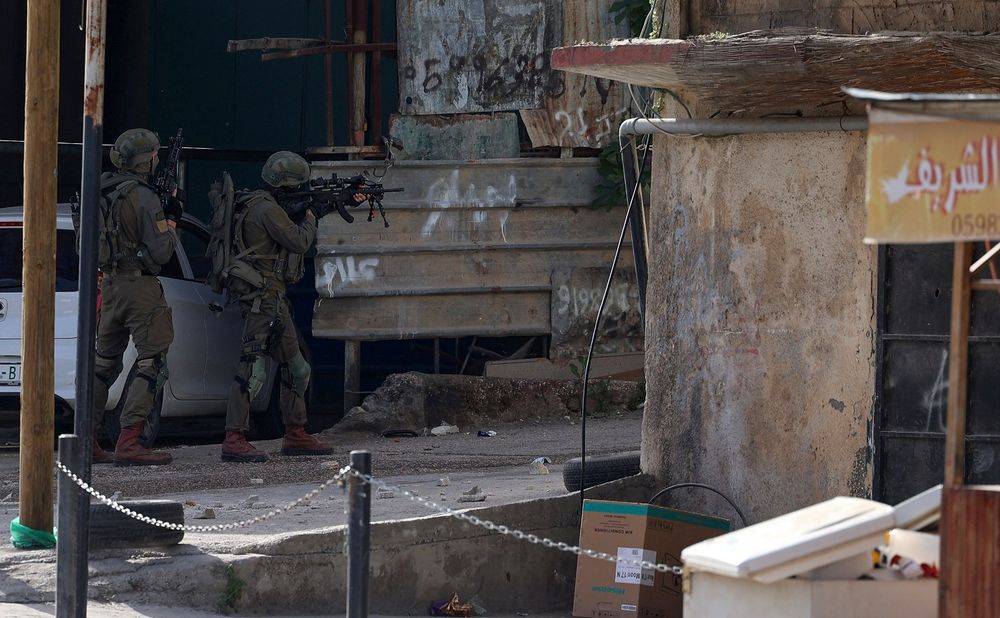 Israeli troops in the Nur Shams Palestinian refugee camp near the northern West Bank city of Tulkarem on April 10, 2022.