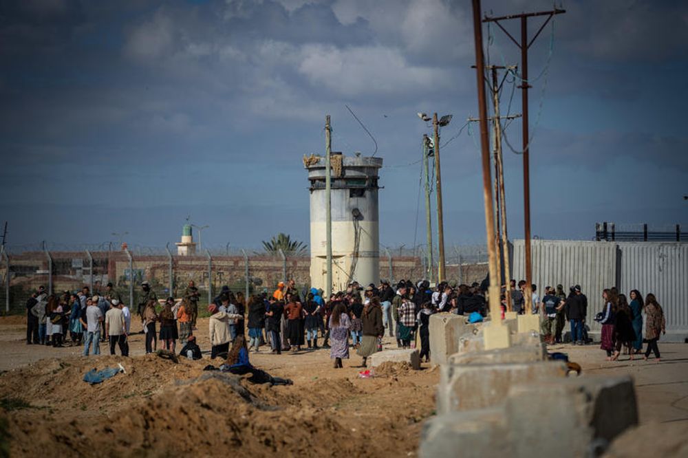 Demonstrators protest against the entry of humanitarian aid trucks into the Gaza Strip, at the Kerem Shalom border crossing in southern Israel, February 22, 2024.
