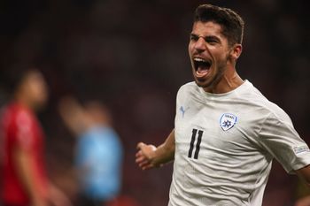 Israel's Manor Solomon celebrates after scoring his side second goal against Albania during the UEFA Nations League soccer match between Albania and Israel at Air Albania stadium in Tirana, Albanian, on Friday, June 10, 2022.