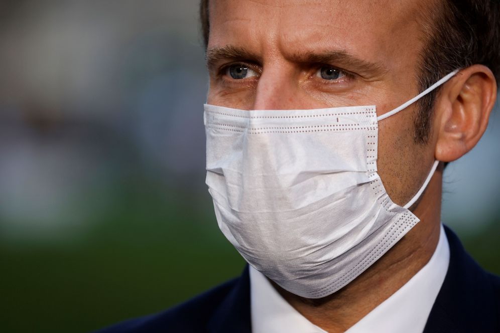 French President Emmanuel Macron wears a protective face mask in Paris amid the coronavirus pandemic, on October 23, 2020