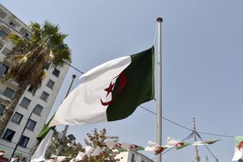 Flags of Algeria fly at half-mast in mourning for the victims of the Kabylie region forest fires in Algeria's capital Algiers, on August 12, 2021.