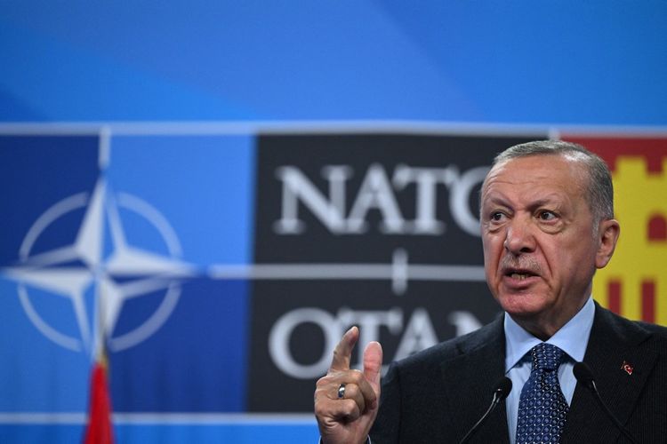 Turkey's President Recep Tayyip Erdogan addresses media representatives during a press conference at the NATO summit at the Ifema congress center in Madrid, on June 30, 2022.