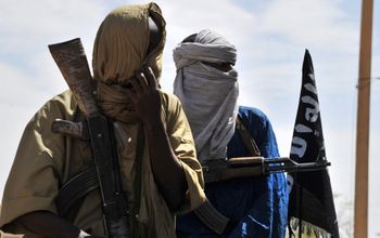 Two Islamist policemen patrol in the streets of Gao, northern Mali, on July 16, 2012.