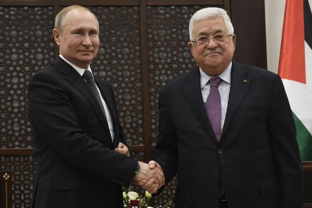 Le président russe Vladimir Poutine rencontre le président palestinien Mahmud Abbas dans la ville de Bethléem, en Cisjordanie, le 23 janvier 2020.