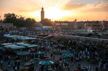 People gather in the landmark Jemaa el-Fnaa square, in Marrakesh, Morocco.