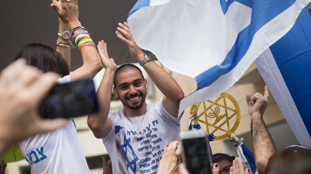 Hadas Parush/Flash90 Family of Elor Azaria celebrates his return outside their home in Ramla on May 8, 2018.