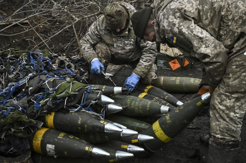 Ukrainian servicemen prepare to fire towards Russian positions with a 155mm M777 Howitzer artillery weapon on the front line near the city of Bakhmut.