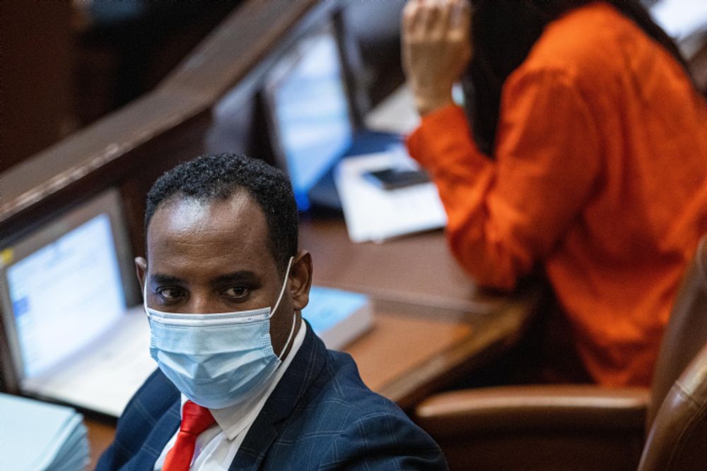 MK Gadi Yevarkan attends a vote on a law proposing reforms regulating medical marijuana in the assembly hall of the Israeli parliament, in Jerusalem, on October13, 2021.
