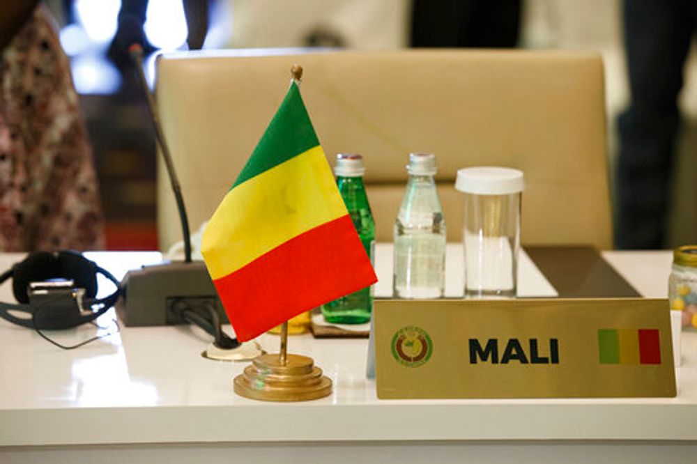 The seat of the representative of Mali stands empty during the fifth extraordinary summit in Accra, Ghana, March 25, 2022.