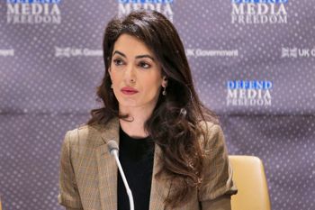 Attorney Amal Clooney listens during a panel discussion on media freedom, Sept. 25, 2019, at the United Nations headquarters.
