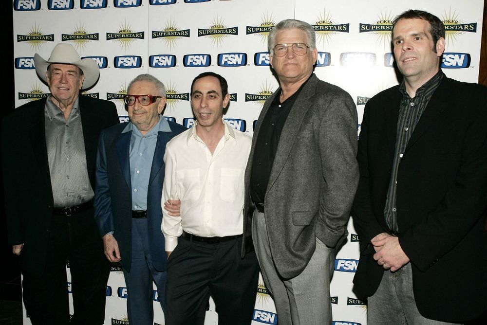 Poker players including Henry Orenstein (second from the left) attend Fox Sport Net's "Poker Superstar Invitational Tournament" in New York, United States, on August 10, 2004.