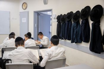 Ultra-Orthodox Jewish children seen the first day of school at an ultra-Orthodox school in the Neve Yaakov neighborhood of Jerusalem on August 9, 2021.
