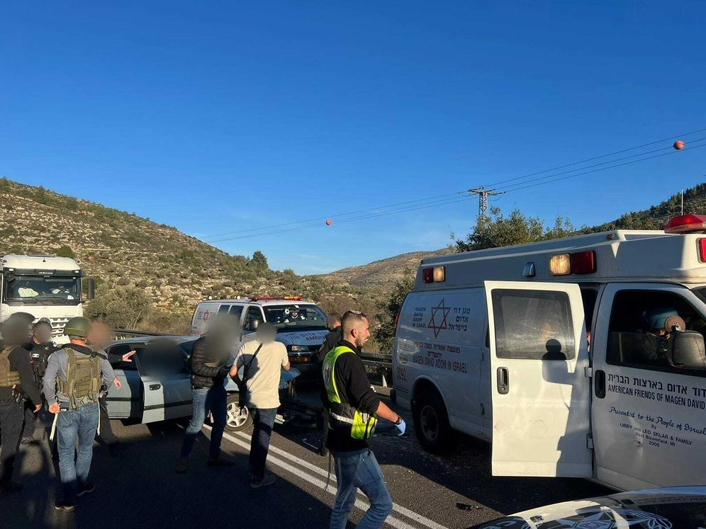 Scene of a shooting attack in the West Bank, with Magen David Adom (MDA) paramedics responding.