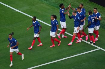 France's Bradley Barcola (12) celebrates scoring their second goal with teammates during the World Cup round of 32 soccer match between France and Sweden in East Rutherford, N.J., near New York, Tuesday, June 30, 2026. 
