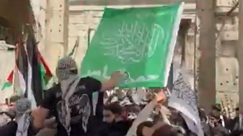 Hamas flag flown at a rally in Damascus calling for jihad against Israel 