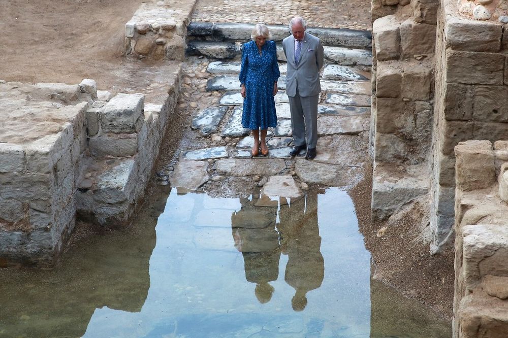 UK's Prince Charles and his wife Duchess Camilla visit the site where Jesus is believed by Christians to have been baptized on the Jordan River, in Jordan, on November 16, 2021.