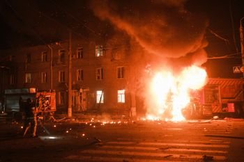 Firefighter's vehicle is seen on fire after Russian drone strikes on residential neighborhood in Kharkiv, Ukraine, on Thursday, April. 4, 2024.