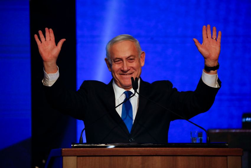 Israeli Prime Minister Benjamin Netanyahu addressees his supporters at party headquarters after elections in Tel Aviv, Israel, Wednesday, Sept. 18, 2019.