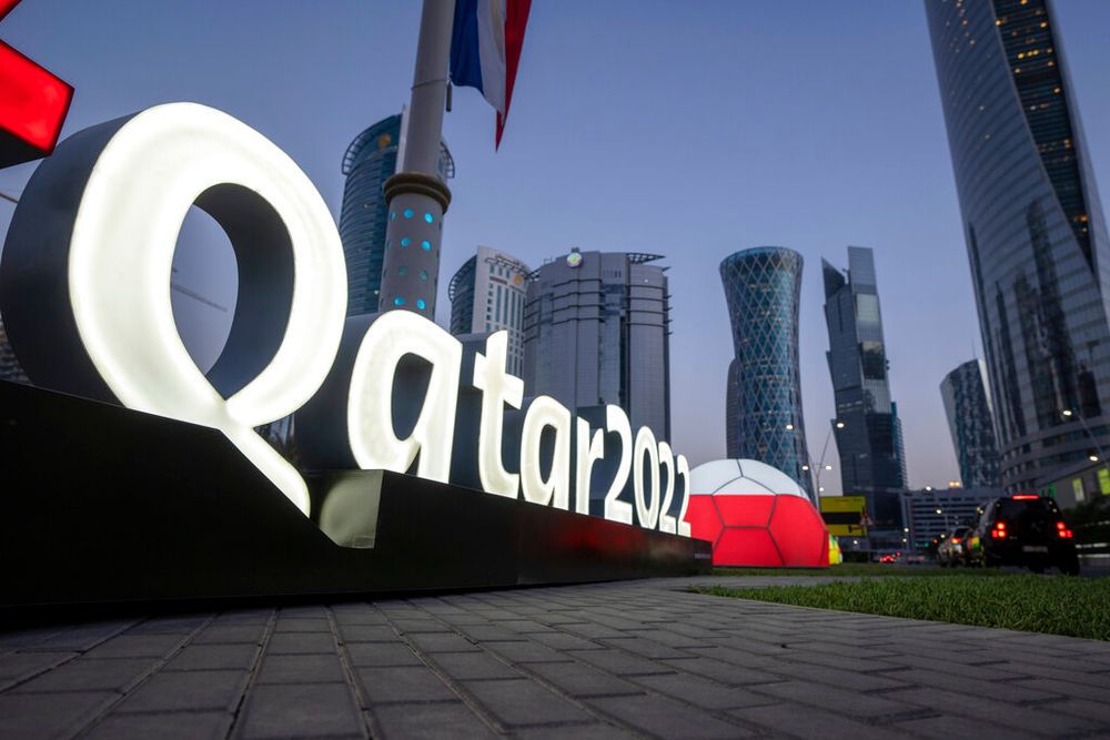 Branding is displayed near the Doha Exhibition and Convention Center, in Doha, Qatar.