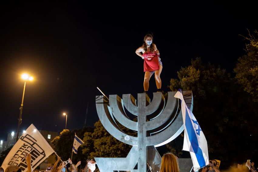 Israel Topless Protester On Menorah Outside Knesset Stirs Fury I24news