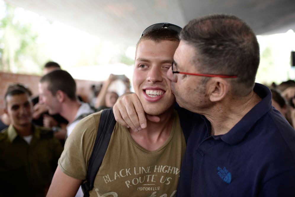 Friends and family say goodbye upon young soldiers enlistment to the Israeli military base at Tel-Ha'shomer military base in Israel.