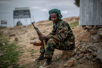 A fighter loyal to the Tigray People's Liberation Front mans a guard post on the outskirts of the town of Hawzen, in the Tigray region of northern Ethiopia.
