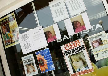 Poster are displayed on shop windows for missing three-year-old British girl Madeleine McCann in the Portuguese beach resort of Lagos, Portugal.