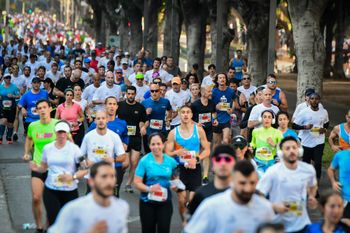 Runners take part in a marathon in Israel's coastal city of Tel Aviv on February 28, 2020.