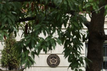 A plaque identifies the Afghanistan Embassy in a leafy, quiet neighborhood in the northwest section of the US capital on August 16, 2021 in Washington, DC, US.