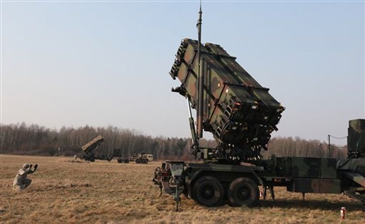 US troops are seen at a test range in Sochaczew, Poland, as part of a joint exercise to demonstrate the Patriot air defense system on March 21, 2015.