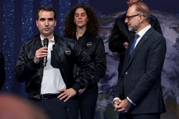 ESA President Josef Aschbacher (R) listens as Belgium's Raphael Liegeois (L) delivers a speech after being appointed ESA newly recruited class of career astronaut during a ceremony to unveil the European Space Agency five new class of career astronauts in Paris, France on November 23, 2022