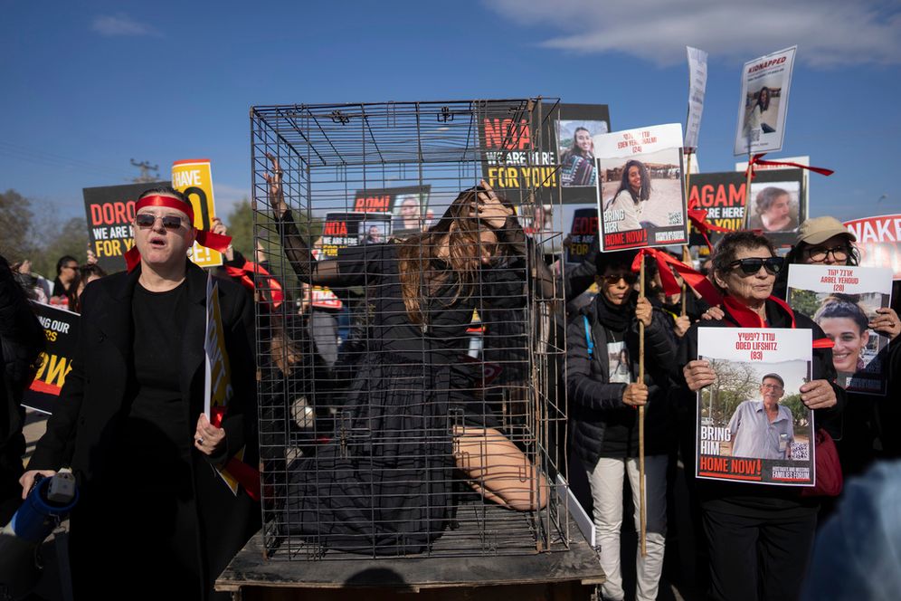 Relatives, supporters and returned hostages, 85-year-old Yocheved Lifschitz (R), attend a march calling for release of Israelis held in the Gaza Strip by Hamas.