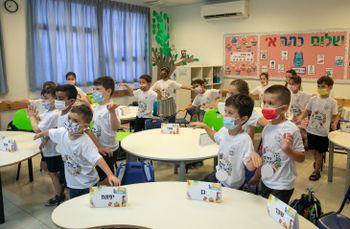 First graders at the Inbalim school in Modi'in Maccabim Reut, Israel, on the first day of the new academic year, September 1, 2021.