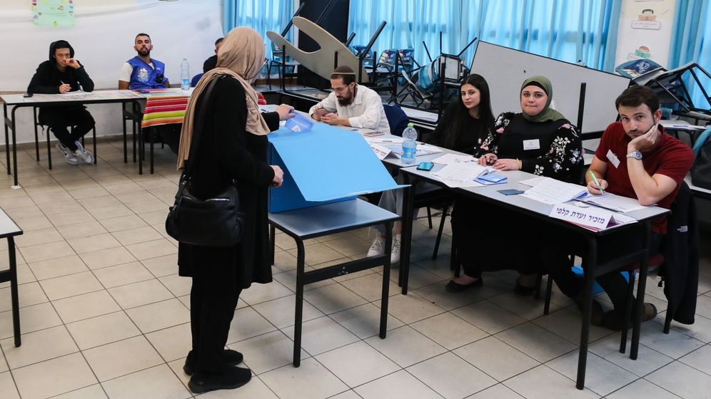 Arab Israelis cast their vote at a voting station in Tayibe, during the Knesset Elections, on November 1, 2022. 