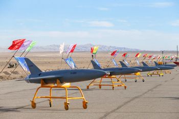 In this photo released on Tuesday, Jan. 5, 2021 by the Iranian army, drones are displayed prior to a drill, in an undisclosed location in Iran. The Iranian military began a wide-ranging, two-day aerial rill in the country's north, state media reported, featuring combat and surveillance unmanned aircraft, as well as naval drones dispatched from vessels in Iran's southern waters.