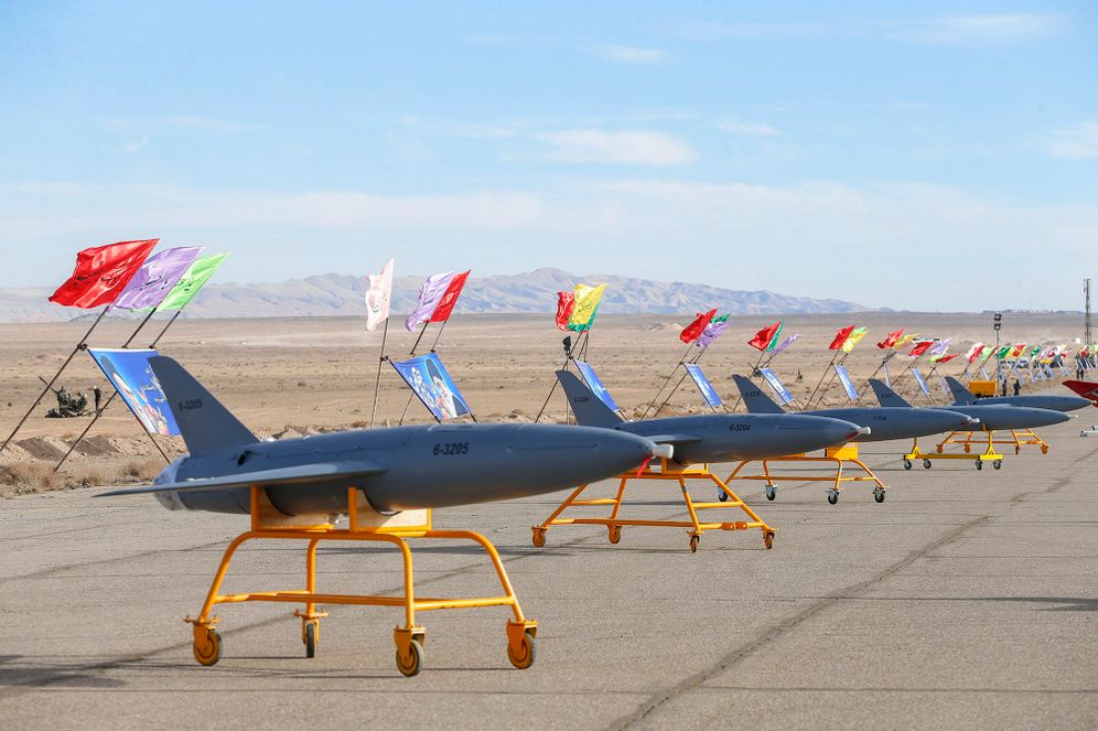 (Iranian Army via AP) In this photo released on Tuesday, Jan. 5, 2021 by the Iranian army, drones are displayed prior to a drill, in an undisclosed location in Iran. The Iranian military began a wide-ranging, two-day aerial rill in the country's north, state media reported, featuring combat and surveillance unmanned aircraft, as well as naval drones dispatched from vessels in Iran's southern waters.