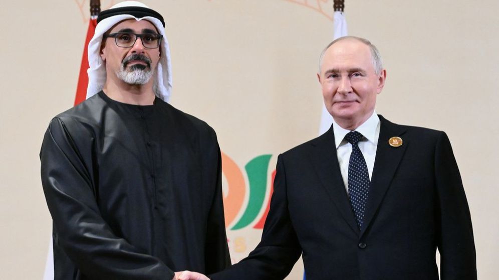 Russian President Vladimir Putin, right and Crown Prince of Abu Dhabi Sheikh Khaled Bin Mohamed Bin Zayed Al Nahyan pose for a photo during their meeting on the sidelines of the BRICS Summit in New Delhi, India, on Saturday, Sept. 12, 2026