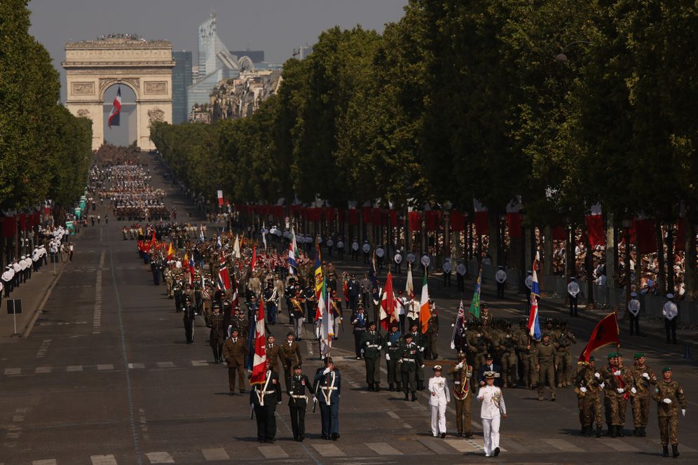 Coalition of the Willing troops march during the Bastille Day military parade on the Champs-Elysees avenue, in Paris, Tuesday, July 14, 2026