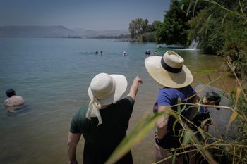 People enjoy at the Sea of Galilee