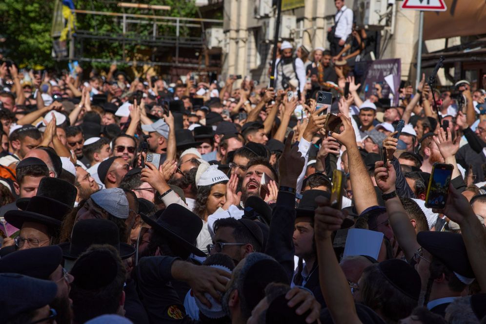 Orthodox Jews pray at the gravestone of Rabbi Nachman, the great grandson of the founder of Hasidic movement, to mark the Jewish new year in the town of Uman, 200 kilometers (125 miles) south of Ukraine's capital Kyiv, Ukraine, Monday, Sept. 22, 2025. 

