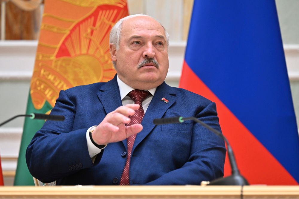 Belarusian President Alexander Lukashenko makes a joint statement with Russian President Vladimir Putin following Russian-Belarusian negotiations at the Palace of Independence in Minsk, Belarus, Friday, May 24, 2024.