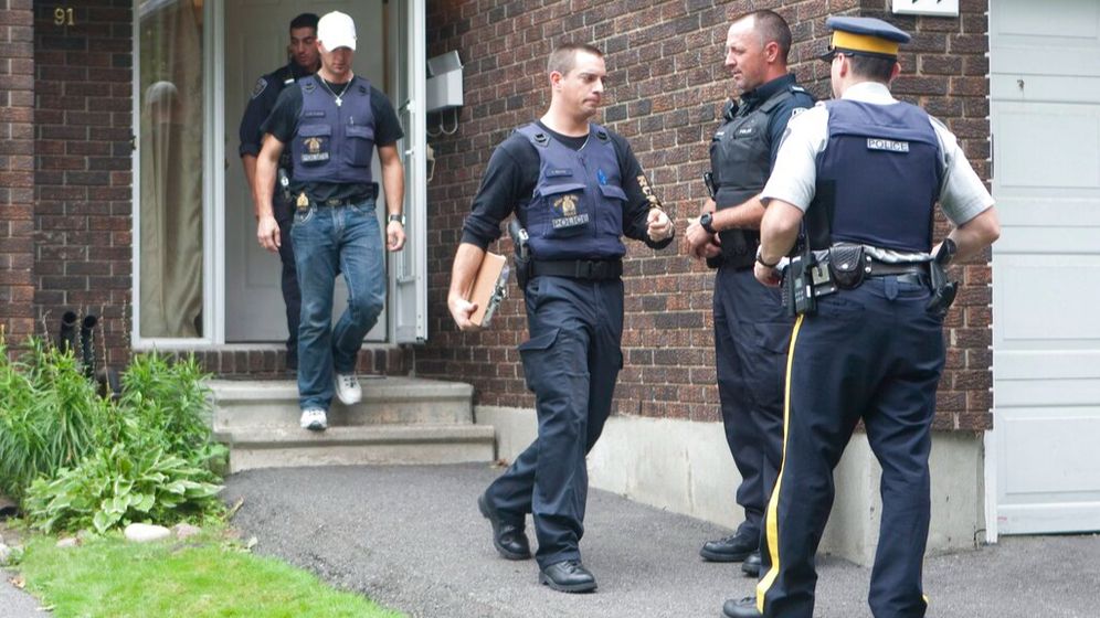 AP Photo/The Canadian Press, Adrian Wyld Illustration - Policier canadiens